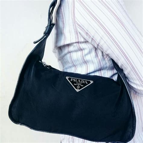 harga tas prada pria original.